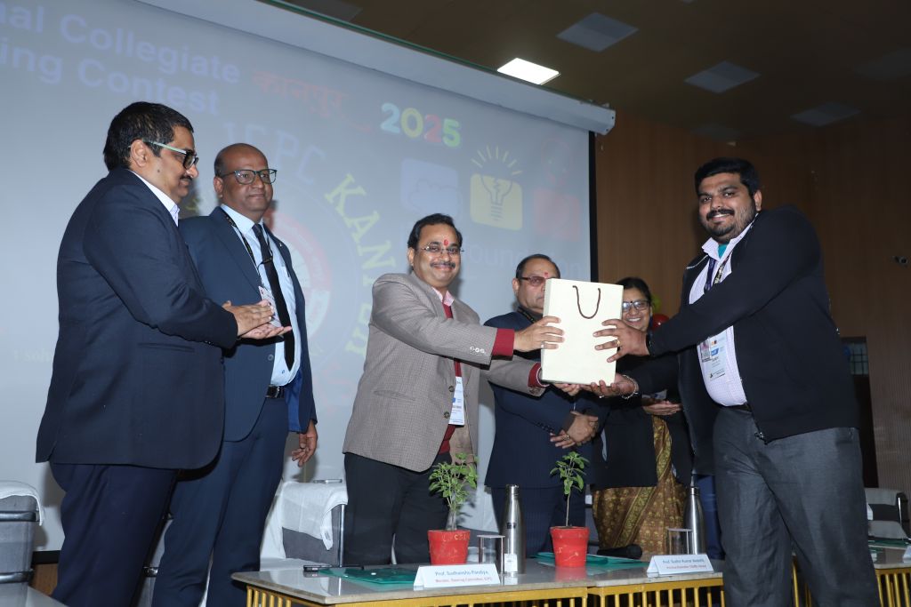 A contestant receiving recognition on stage